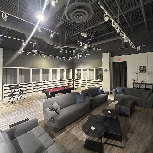 Lounge seating, a pool table and high-top tables at Chil_Space
